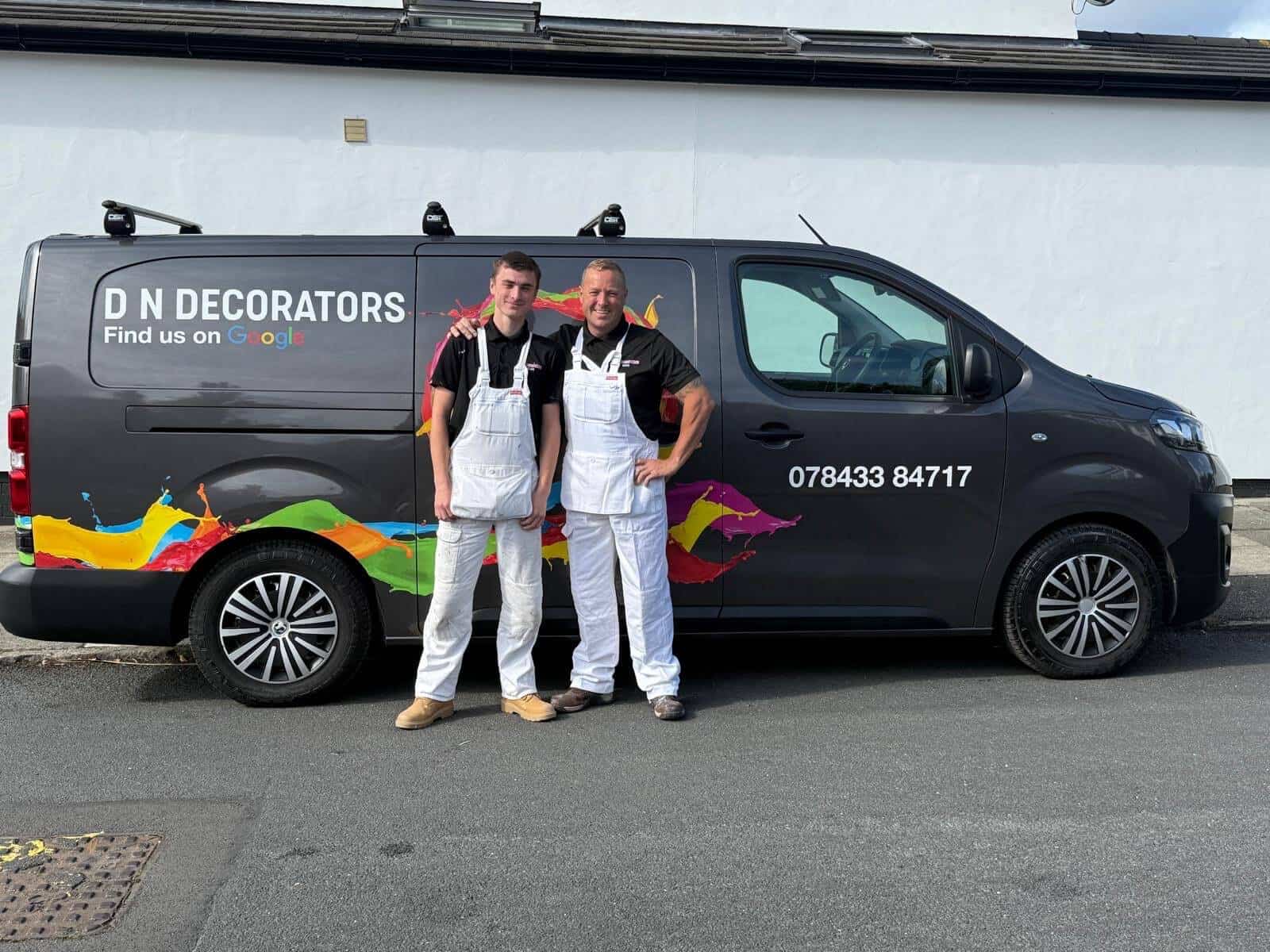 D N Decorators painting team with branded work van Bebington Wirral
